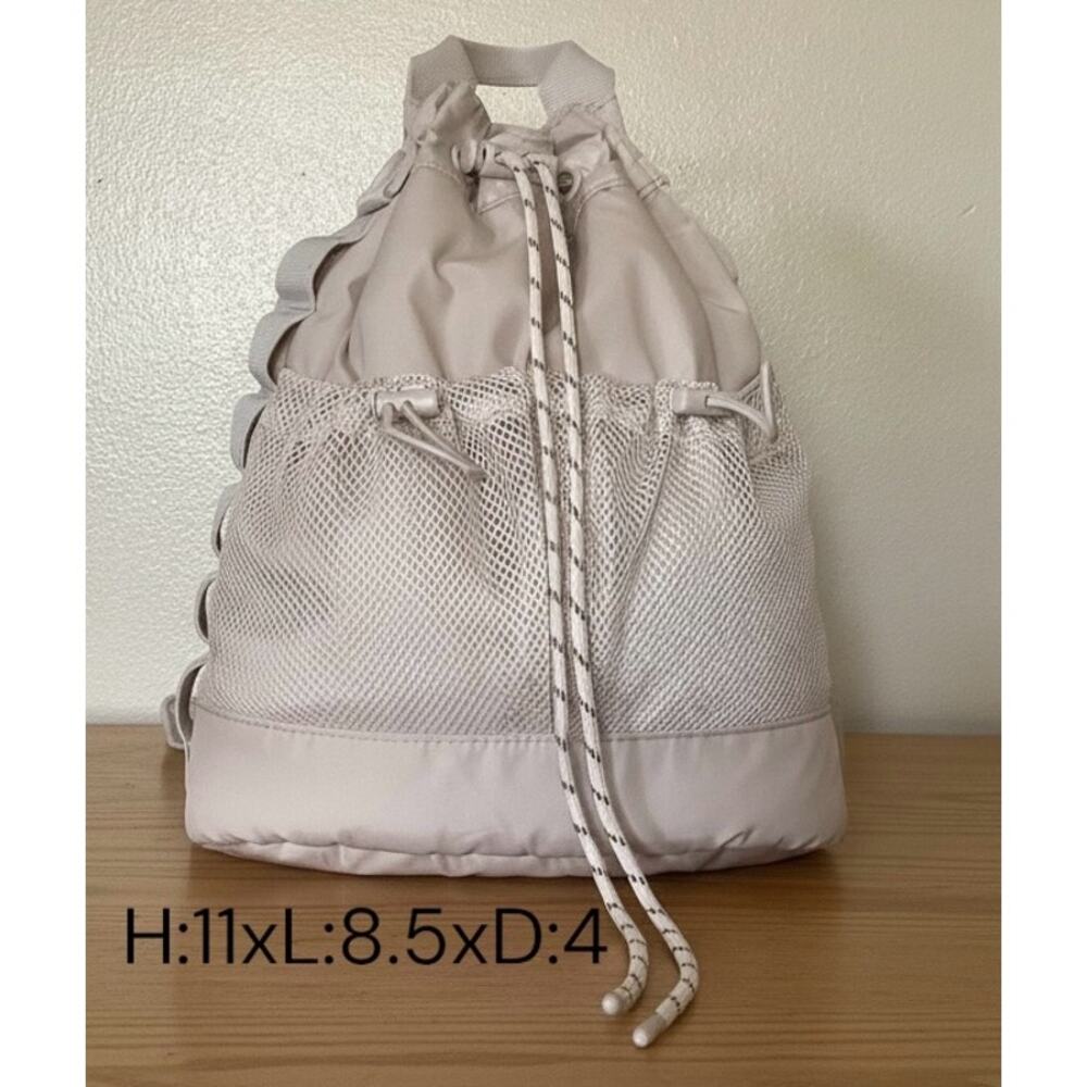 Dagne Dover Cairo Drawstring Sling Bag Sporty Gorpcore Crossbody cream